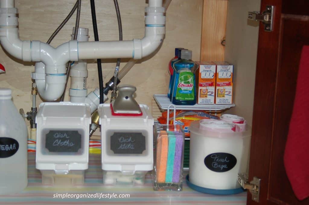 Items stored under the kitchen sink 