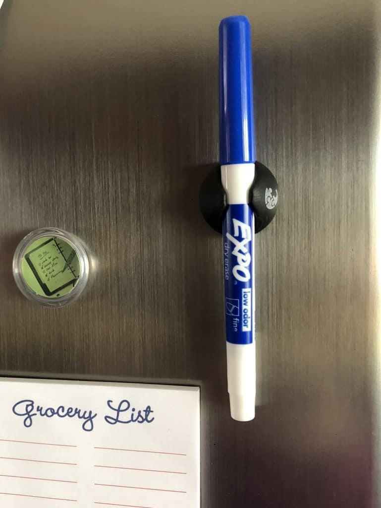 Clip organizer to attach Expo marker to fridge